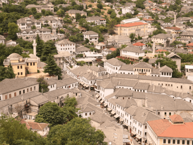 Stone roofs and minaret of Gjirokastër old town, a UNESCO World Heritage city