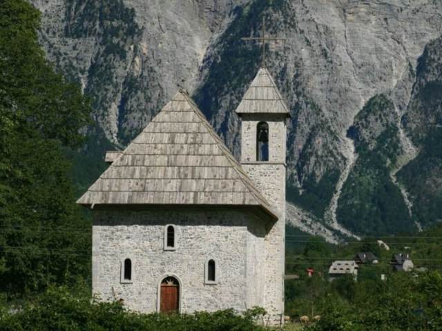 The stone church of Theth village below the Albanian Alps