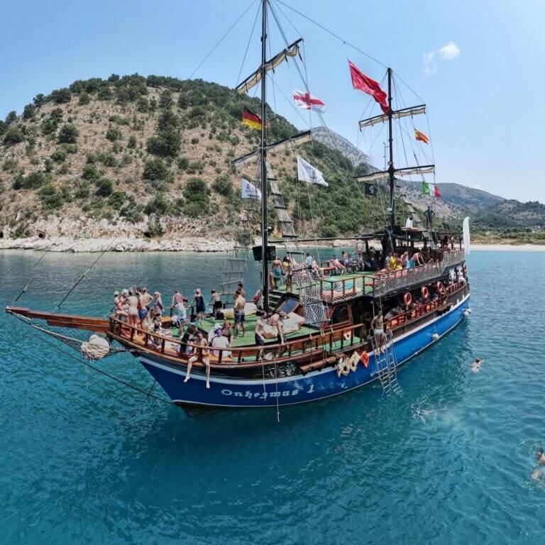 A boat on the Ionian Sea at Saranda on a Ksamil, Saranda and Blue Eye day trip from Tirana