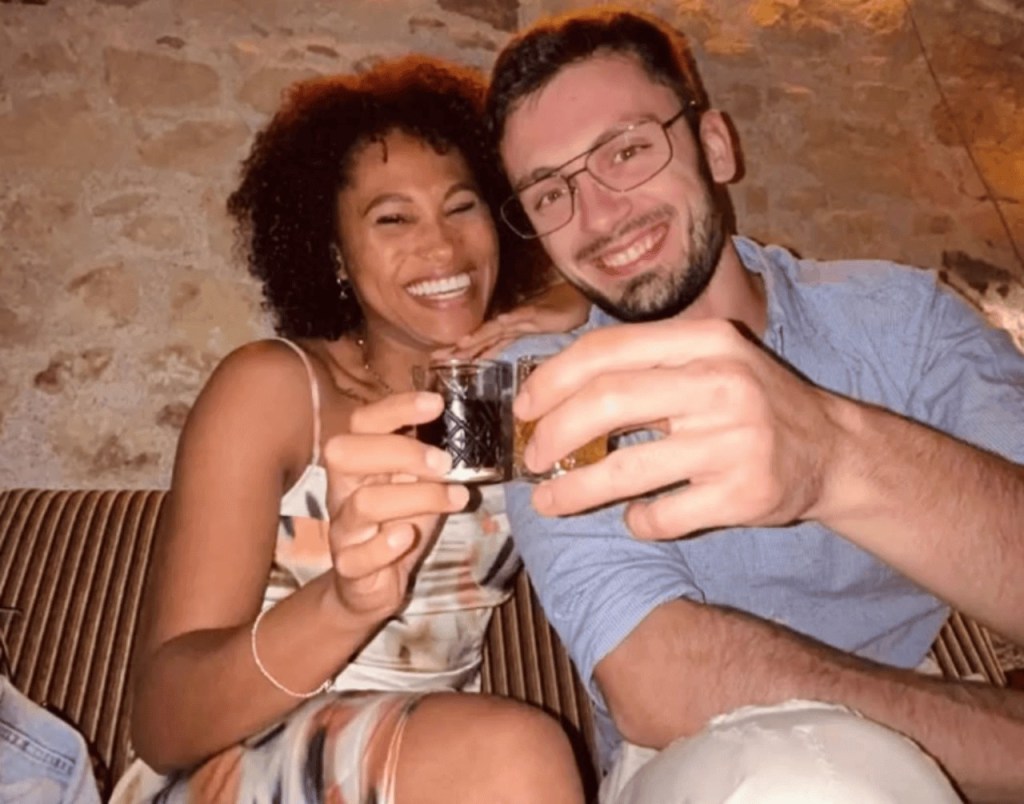 Glasses of Albanian raki served with meze on a table in Tirana