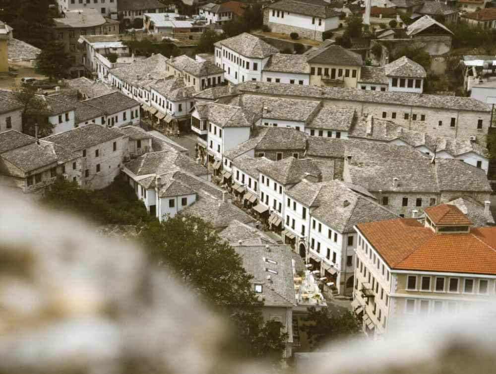 Stone-roofed houses and winding streets in the historic centre of Gjirokastër, Albania