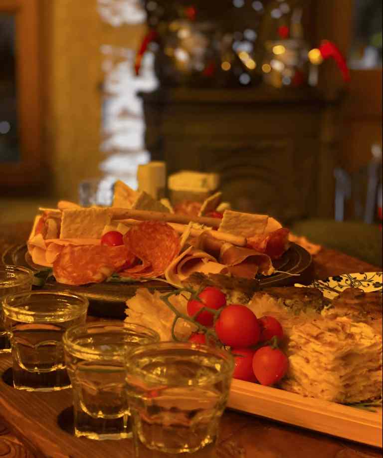 Table set with raki and meze for a tasting in Gjirokastra