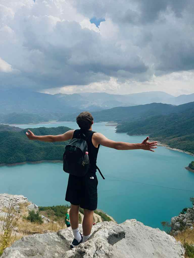 Hiking to an alpine lake viewpoint in the Albanian mountains