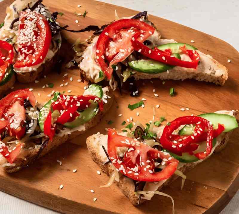 Bruschetta-style meze served with raki in Vlora