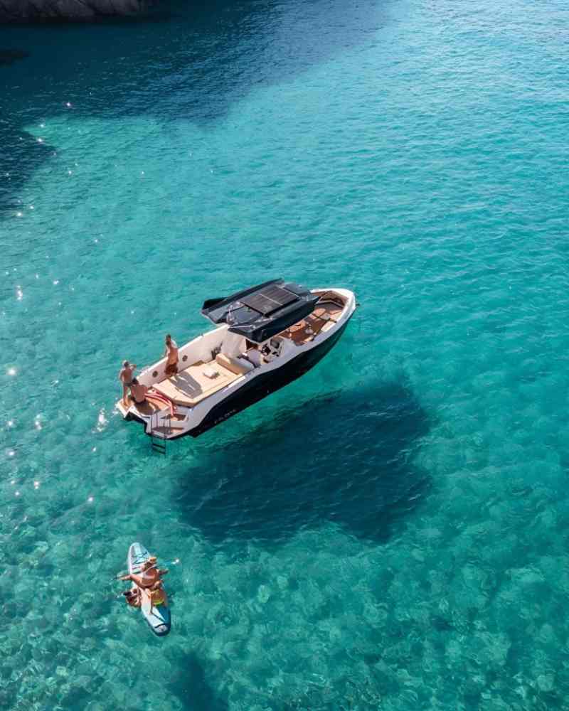Private boat on the turquoise water near Saranda