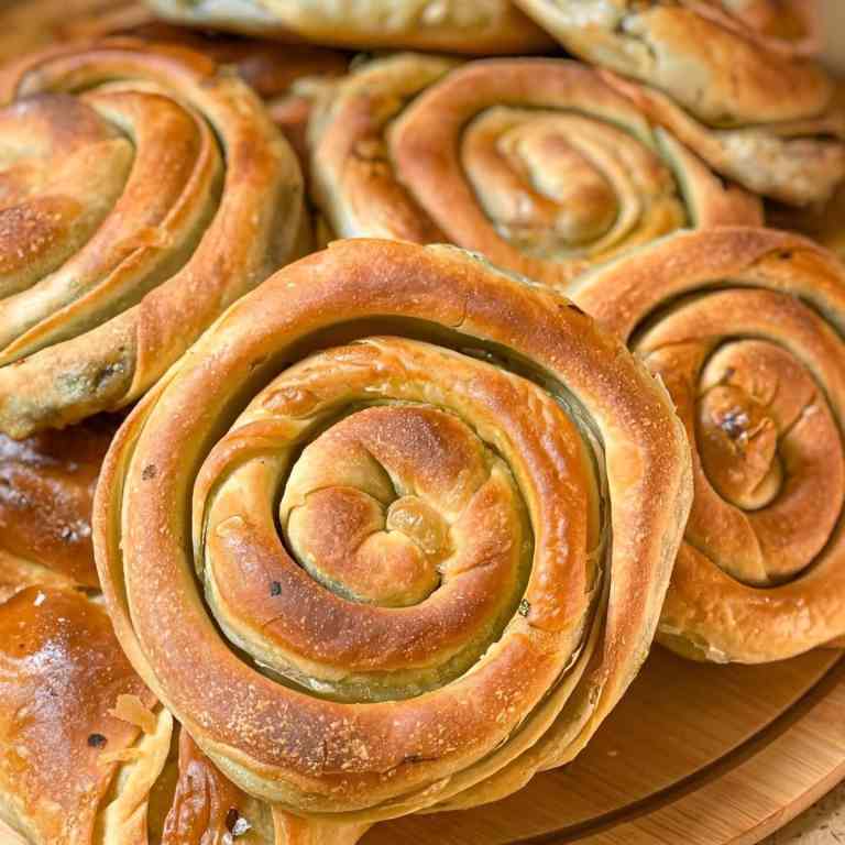 Spiral byrek pastries fresh from the oven on a Tirana street food tour