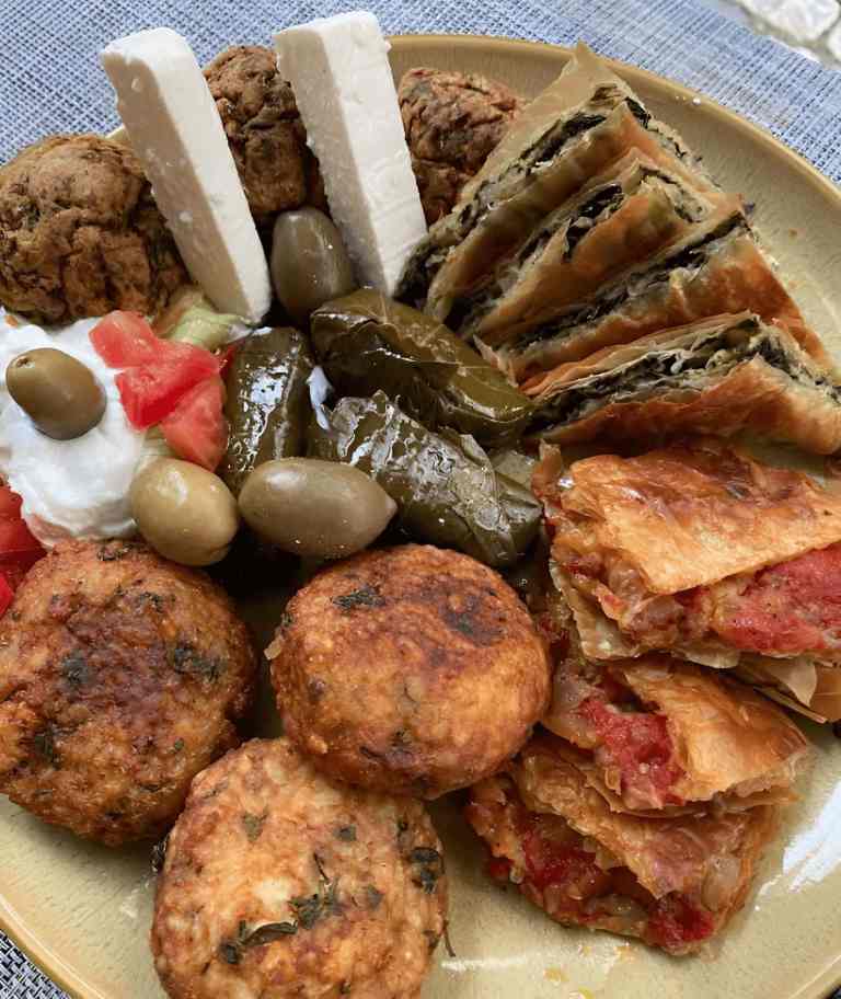 A plate of meze with meatballs, byrek, cheese and olives in Gjirokastra