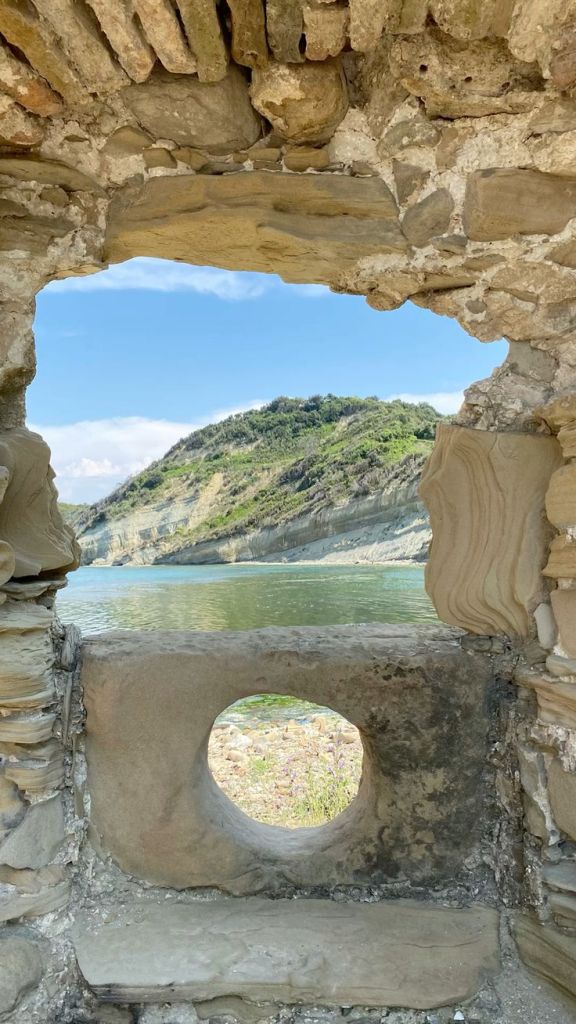 Stone window of Rodon Castle framing the Adriatic coast on the Cape of Rodon, Albania