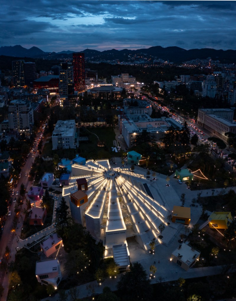 Tirana at night from above with the ferris wheel and Skanderbeg Square