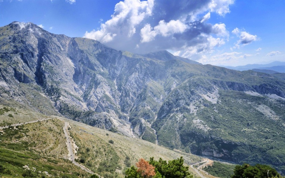 Mountain road winding through a valley in southern Albania